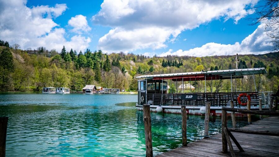 From Split/Trogir/Omiš: Plitvice Lakes Guided Group Tour - The boat cruise and panoramic train: seeing more without killing your feet
