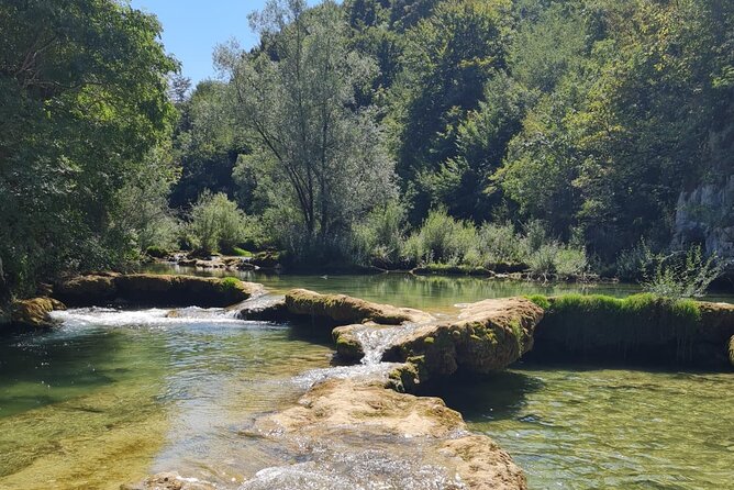 Kayaking in Mreznica Waterfalls near Slunj and Plitvice Lakes - First waterfall stop: the 8–9 m rush, plus jump or swim options