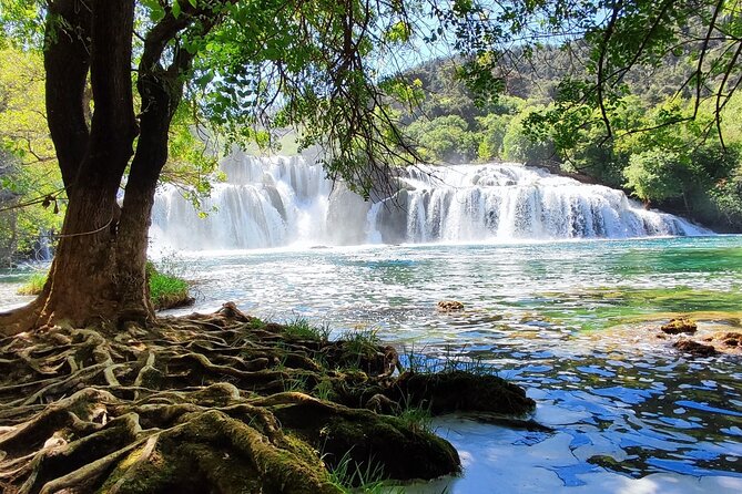Krka Waterfalls half day, Private Tour from Sibenik - Skradinski buk in the National Park: boardwalk views, travertine barriers, and steps