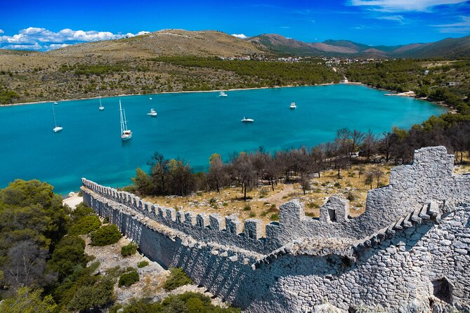 Private Boat Trip Swim and Chill in Crystal Blue Šibenik half day - The Oštrica Chinese Wall stop: small history, big location value