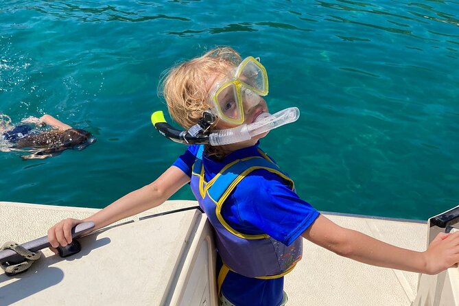Private Half-Day Boat Tour with Snorkeling and Drinks - Getting On the Boat Safely: How Weather Changes the Vibe