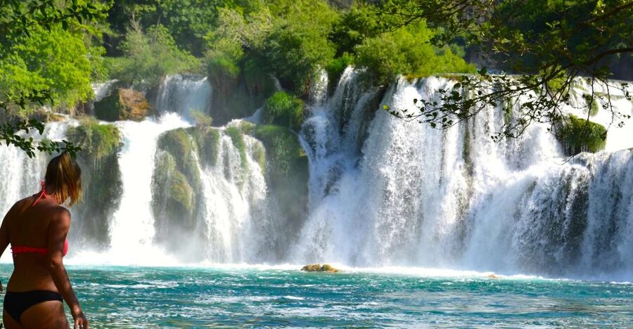 Split: Krka Waterfalls Guided Day Trip with Swim & Boat Tour - Krka National Park: waterfalls, walking breaks, and photo-ready views