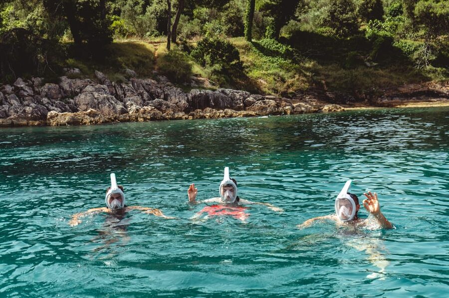 Zadar: 3 Islands Luxury Boat Tour with Aperol Spritz - The final anchor stop between Ugljan and Školjić: choose swim, snorkel, or beach time