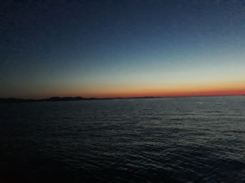 Zadar: Sunset Boat Tour - Crystal-clear sunset water and included snorkeling gear